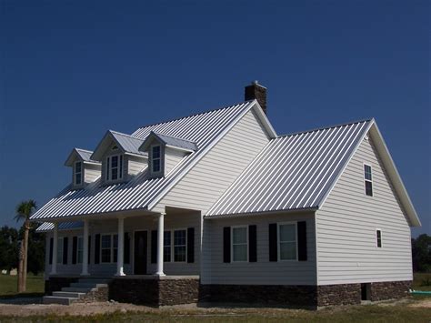 white metal roof on house|white house with galvalume roof.